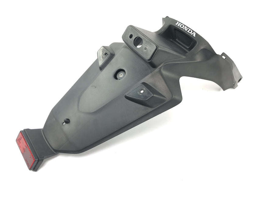 Honda FMX 650 RD12 [2006] - License plate holder splash guard