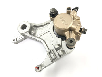 Honda XRV 750 Africa Twin RD04 [1992] - Rear brake caliper Nissin with anchor plate