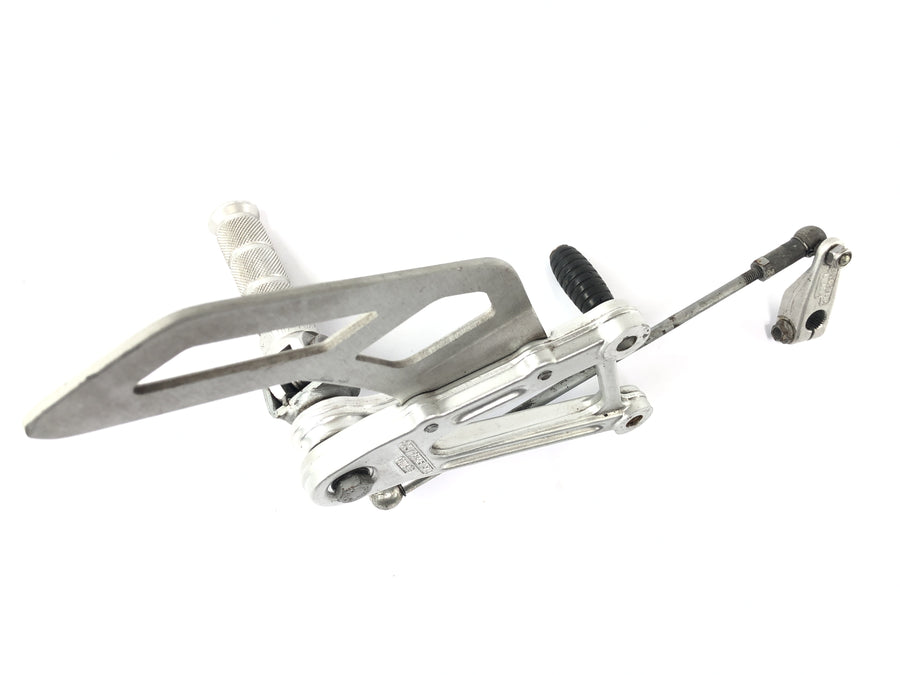 Aprilia SL 1000 Falco Pa [2000] - footrest system driver on the left with switching frames
