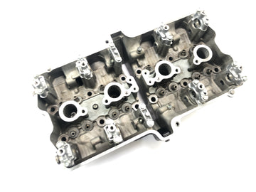 Suzuki GSX R 1100 GU74C [1987] - Cylinder head valve head cylinder head housing - 0