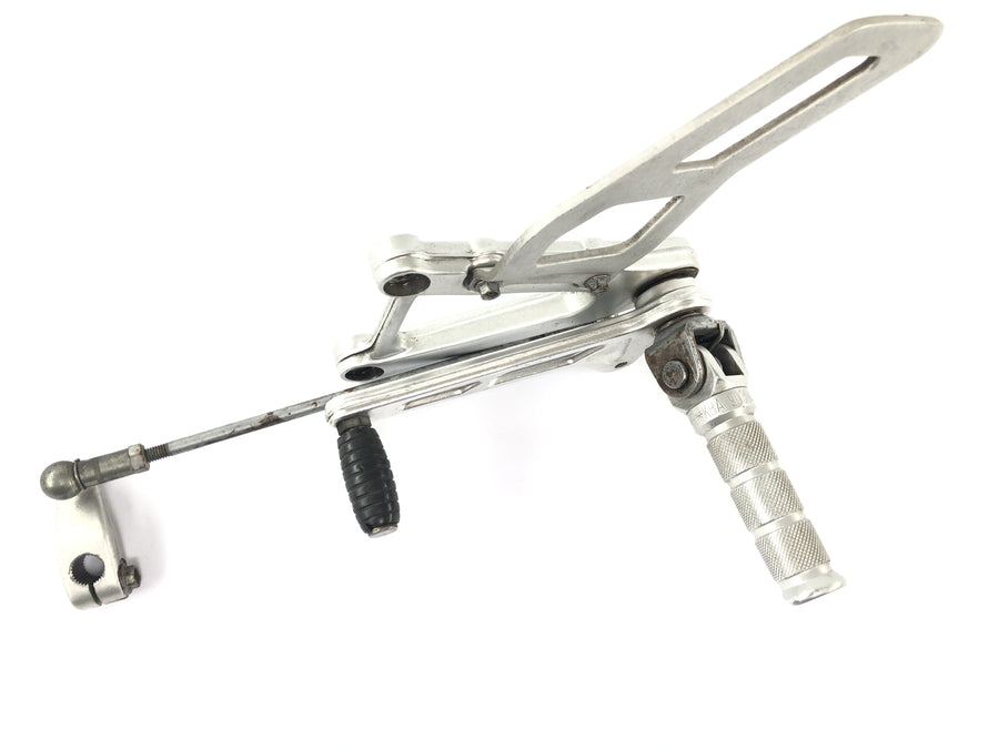 Aprilia SL 1000 Falco Pa [2000] - footrest system driver on the left with switching frames