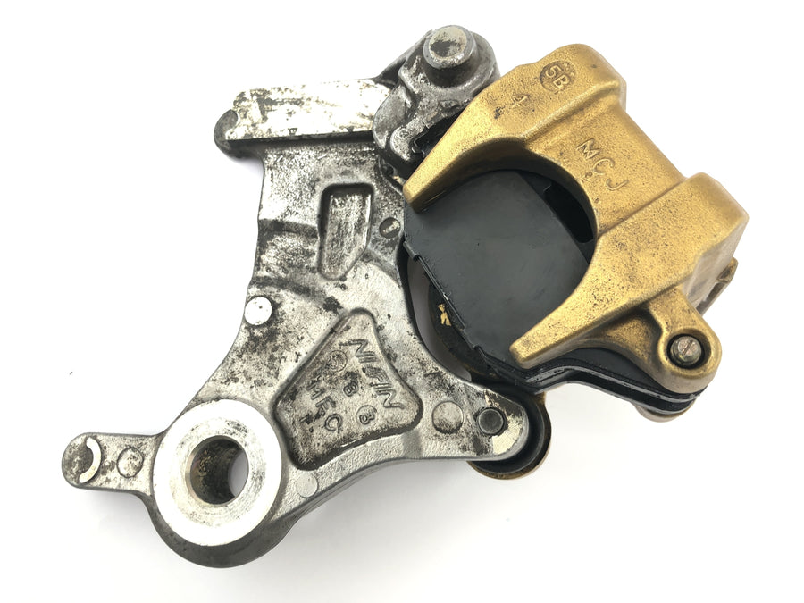 Honda FMX 650 RD12 [2006] - Rear brake caliper Nissin with holder plate